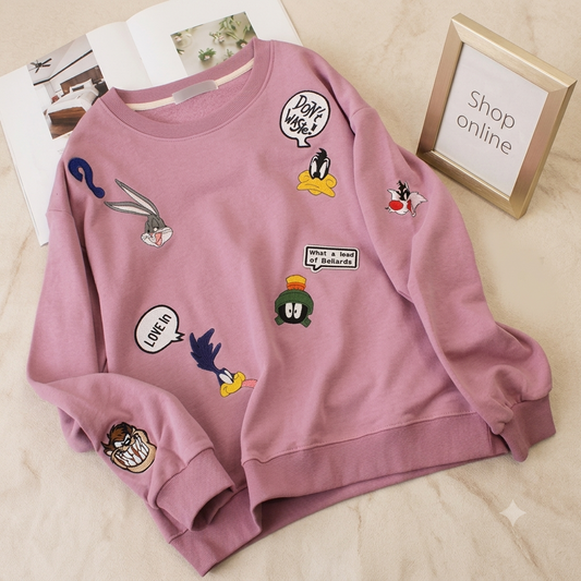 PINK SWEATSHIRT LONEY TONES ALLOVER